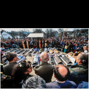 This photograph was taken in March 1993 during a funeral in Bratunac, eastern Bosnia and Herzegovina, amid the war in Bosnia. The ceremony was attended by General Philippe Morillon, commander of UNPROFOR (United Nations Protection Force), who sought to present an objective assessment of the conflict. After witnessing crimes committed against Serbian civilians in nearby villages, including Kravica, Morillon warned of the likelihood of retaliatory violence. His public statements led to criticism from multiple sides of the conflict. The image documents a moment of collective mourning, underscoring the human cost of war and the complexity of responsibility in armed conflicts, where crimes are committed by individuals on all sides, though greater responsibility lies with those holding greater power.