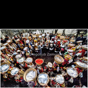 This photograph documents a traditional gathering of the Mijaci community in the Reka region of present-day North Macedonia. Shot from an elevated viewpoint, it captures a ceremonial circle dance in which women, dressed in elaborate traditional costumes, carry ritual baskets with offerings. The composition reveals the rhythm of collective movement, the richness of textile patterns, and the symbolic meaning of the offerings, reflecting a strong sense of communal identity and continuity of tradition passed down through generations. The image is part of a long-term documentary project on Macedonia, initiated in the mid-1970s.