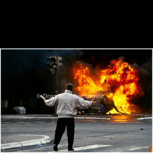 In early May 1990, amid the political changes preceding the breakup of Yugoslavia, pupils at an elementary school in central Belgrade threw a portrait of Josip Broz Tito out of a classroom window. At the time, the president’s portrait was still a mandatory fixture in every classroom across the country. Captured during a regular school day, the photograph documents a symbolic gesture marking a break with the former system and foreshadowing the profound social and political transformations that would soon follow.
